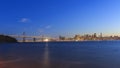 San Francisco Ã¢â¬â Oakland Bay Bridge with lights at sunset time Royalty Free Stock Photo